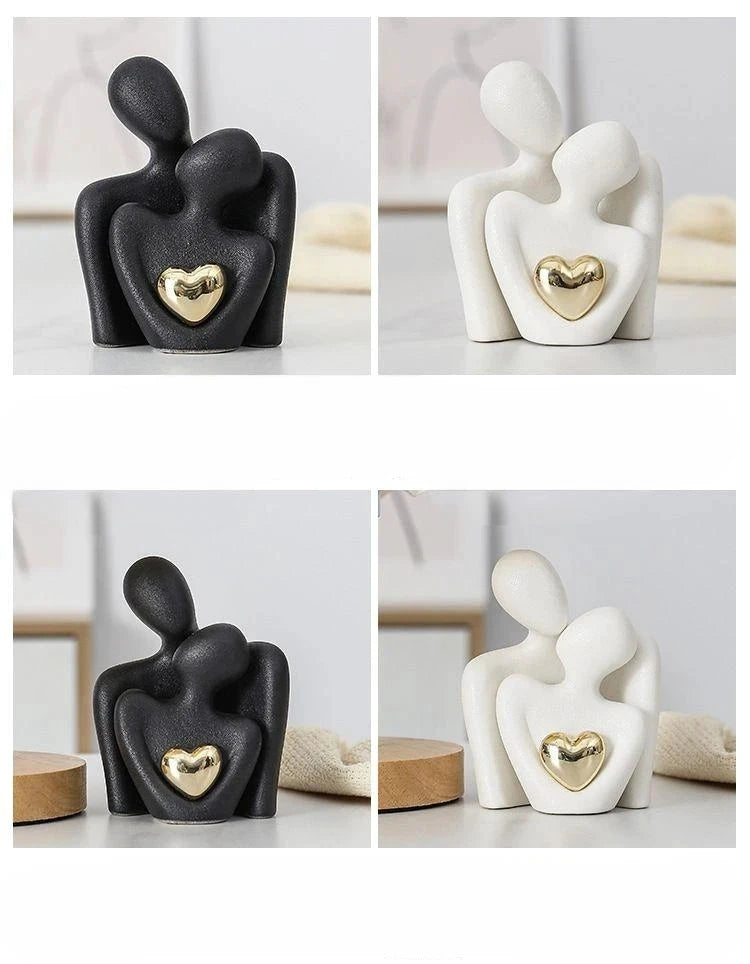 Vergoldete Herzfigur aus schwarz-weißer Keramik