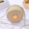 Sac à main rond en rotin naturel avec bandoulière, motif fleur orange sur le devant