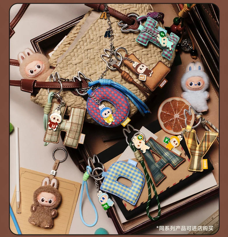 POPMART les monstres broche pour amour série lettre pendentif boîte aveugle devinez sac boîte mystère jouets poupée Anime Figure ornements cadeau by LSDLBoutique.ch