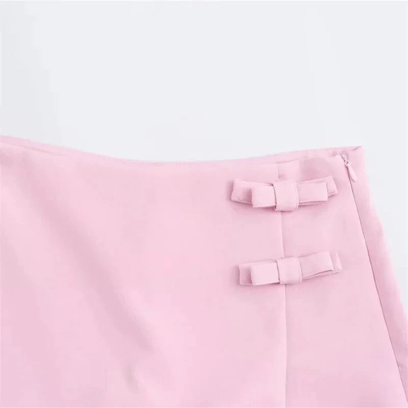 Jupe courte femme Skort rose pastel avec deux nœuds sur la taille et zip côté