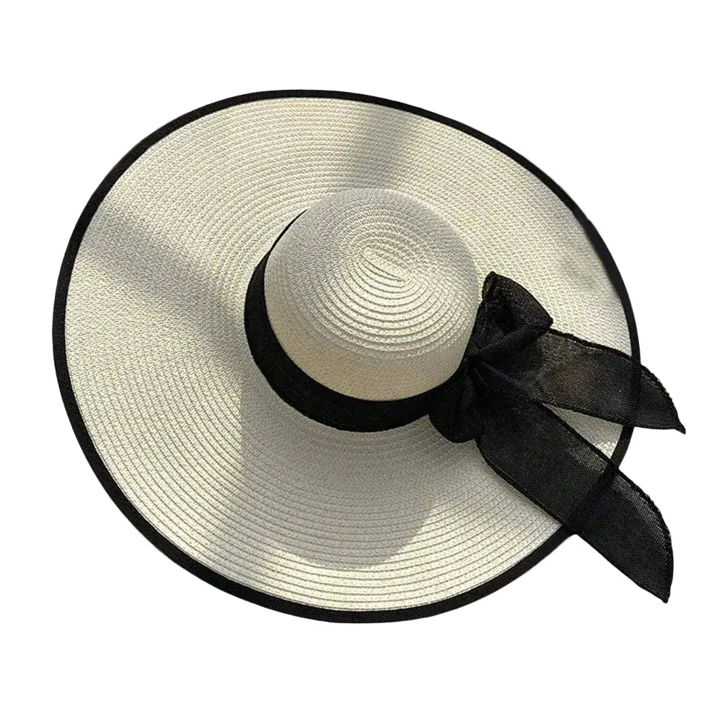 Chapeau de plage en paille à grand bord et nœud décoratif