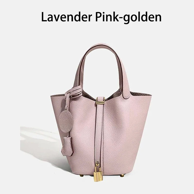 Sac à main seau Mendy en cuir véritable, coloris lavande-rose, poignées doubles et fermoir doré