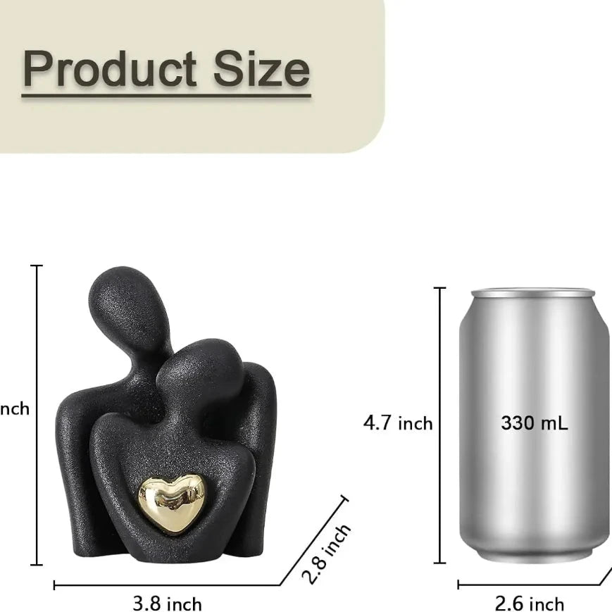 Vergoldete Herzfigur aus schwarz-weißer Keramik