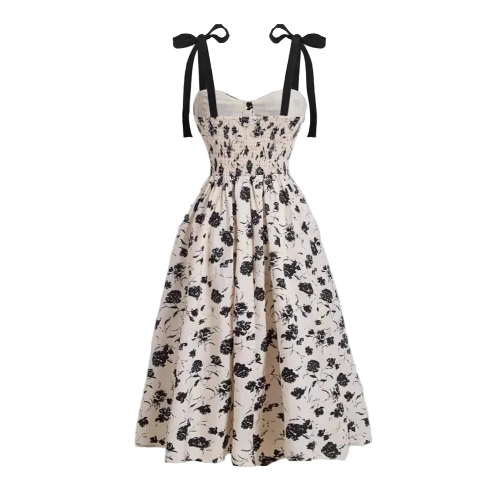 Robe mi-mollet bretelles fines imprimé floral
