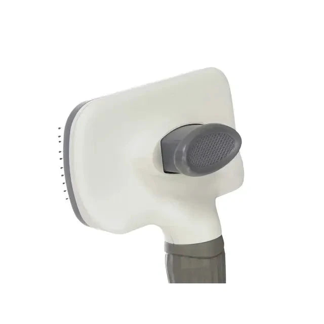 Face arrière de la brosse pour chiens Mascow avec mécanisme de retrait des poils