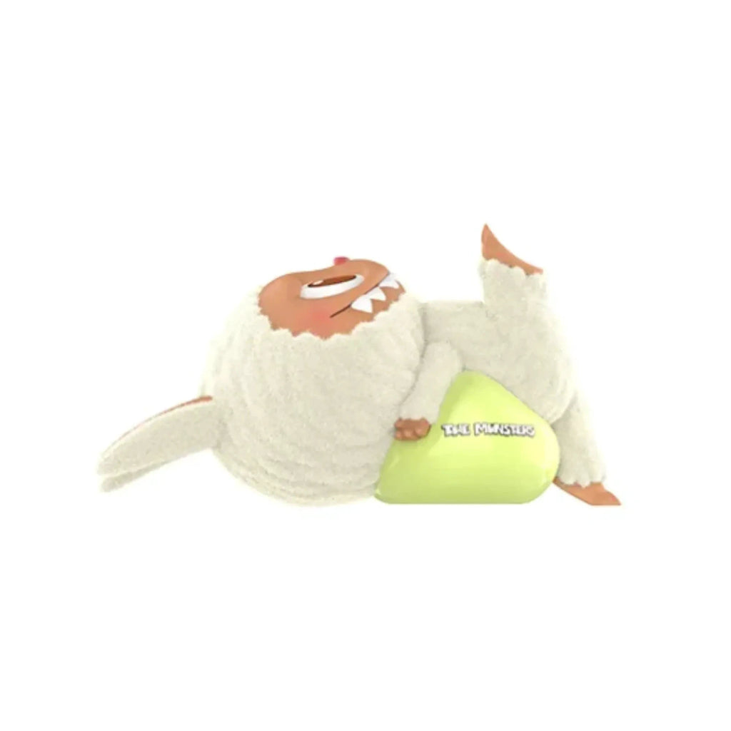 Mon Labubu The Monsters Lazy Labubu figurine, white fuzzy blind-box character lounging on lime green pillow