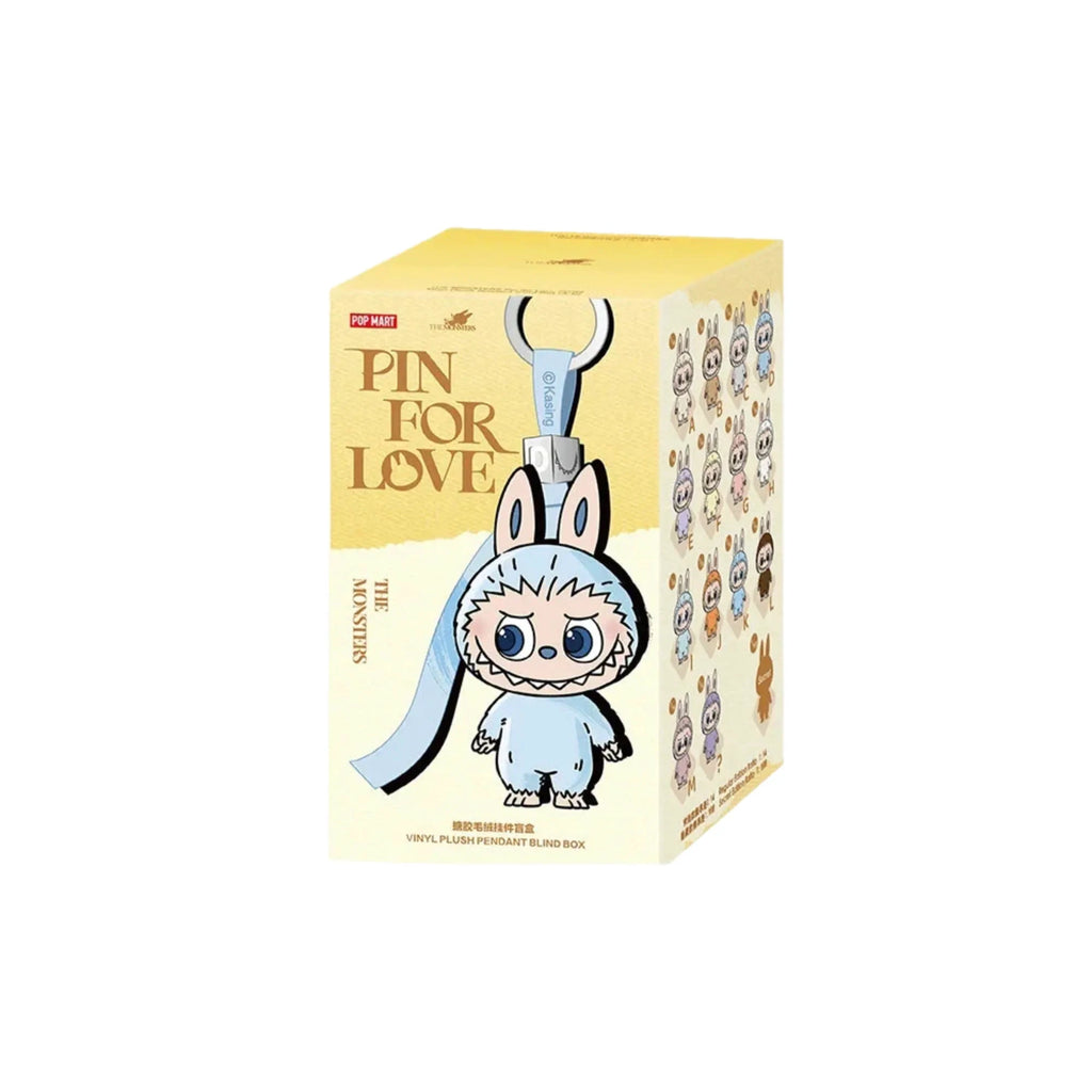 Labubu figurine vinyle peluche The Monster Pin for Love par POP MART dans boîte jaune
