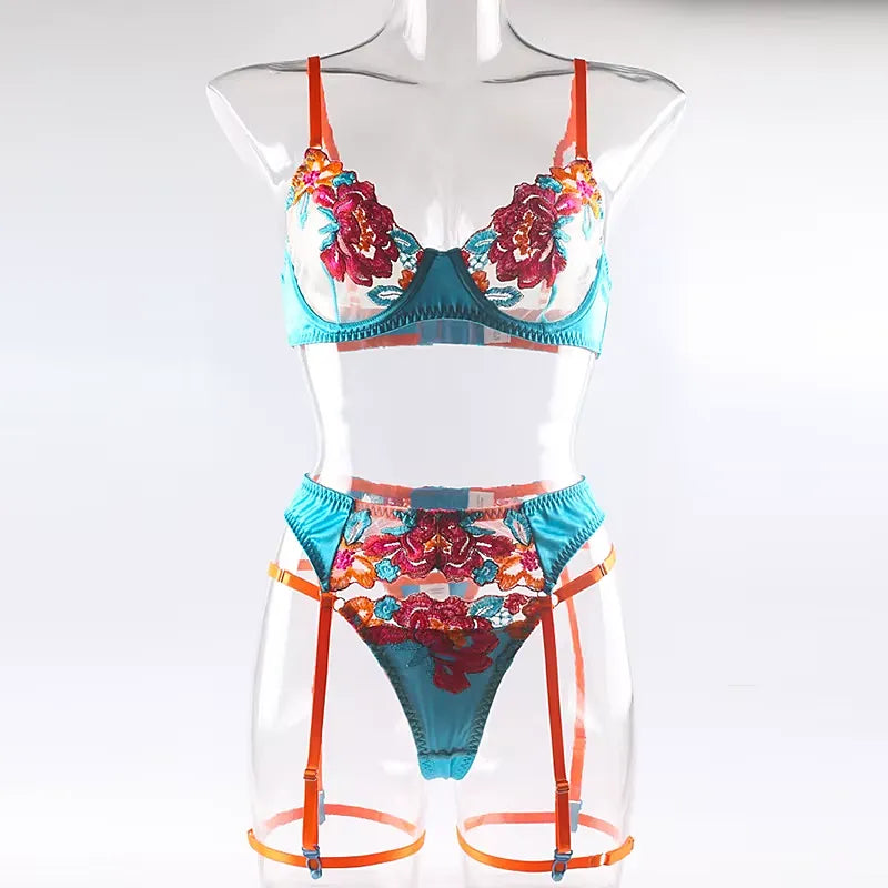 Ensemble lingerie dentelle florale brodée 3 pièces en turquoise et orange, bretelles et jarretelles visibles