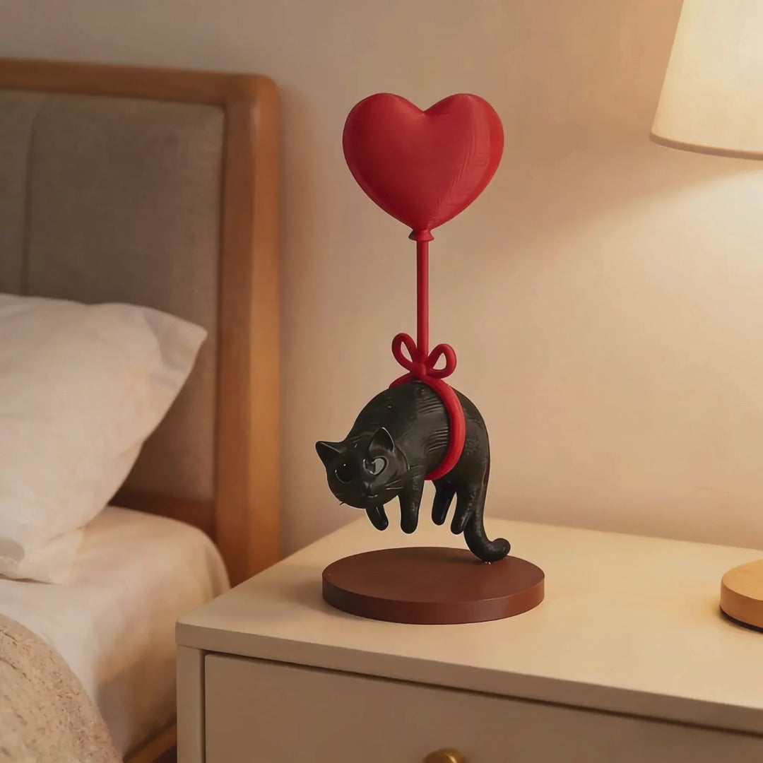 Floating Cat Figurine with Heart Balloon